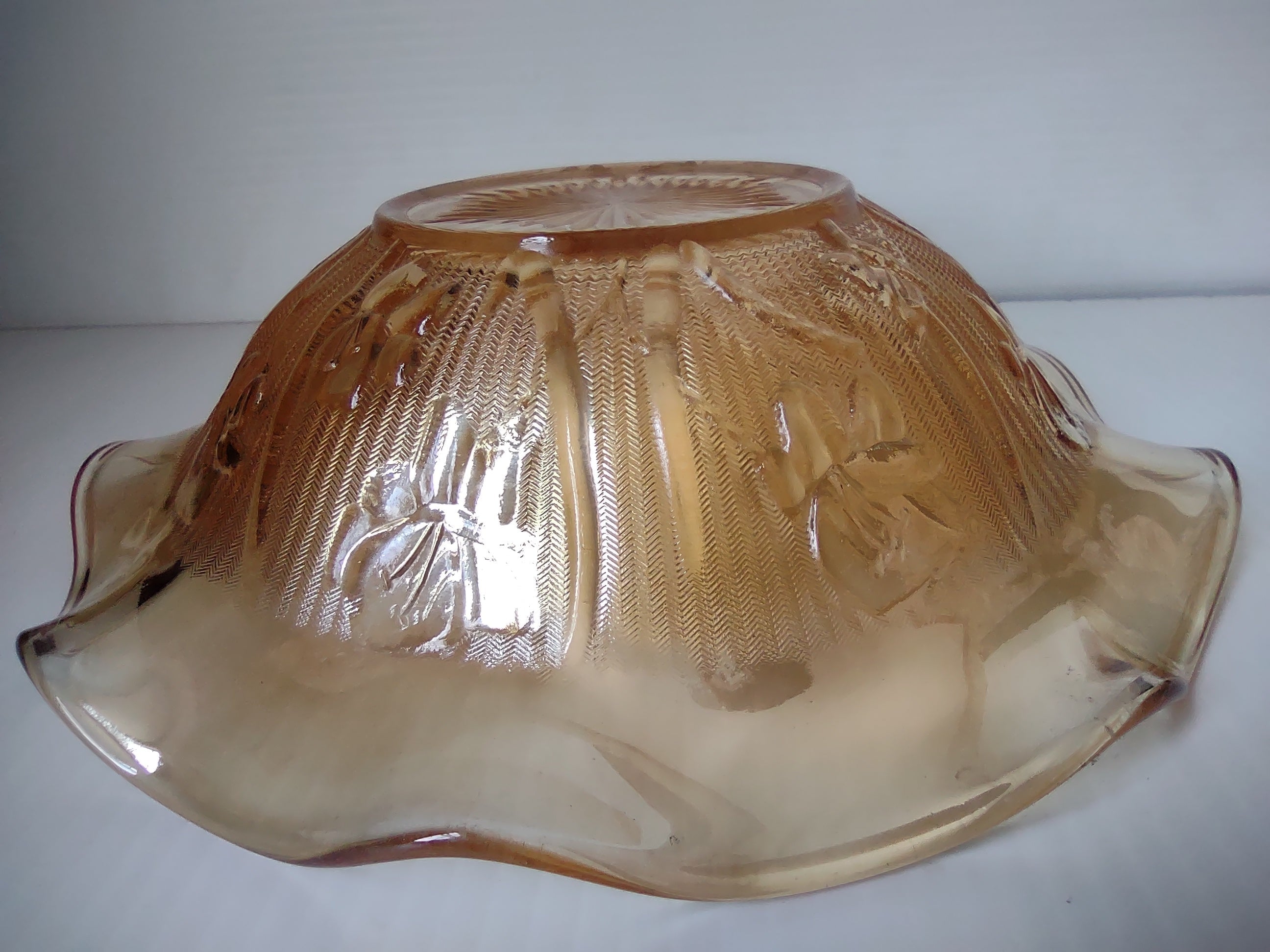 Vintage marigold carnival glass ruffled wave bowl front view