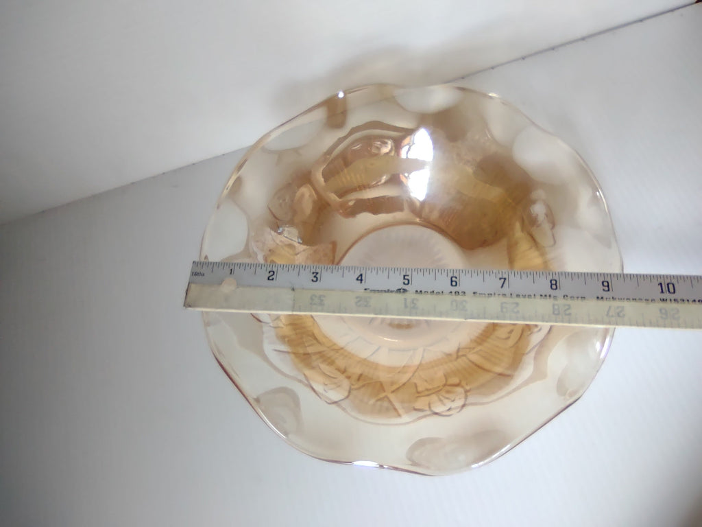Vintage marigold carnival glass ruffled wave bowl angled view