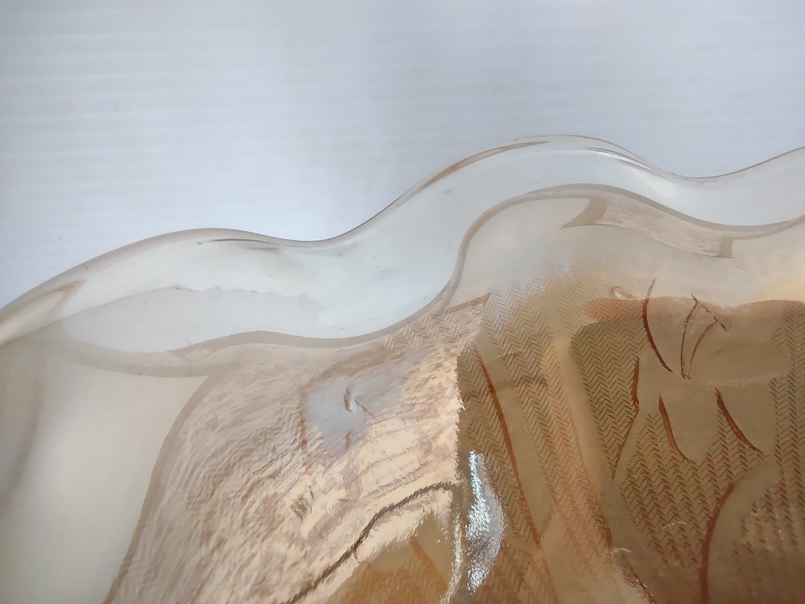 Vintage marigold carnival glass ruffled wave bowl floral leaf interior detail