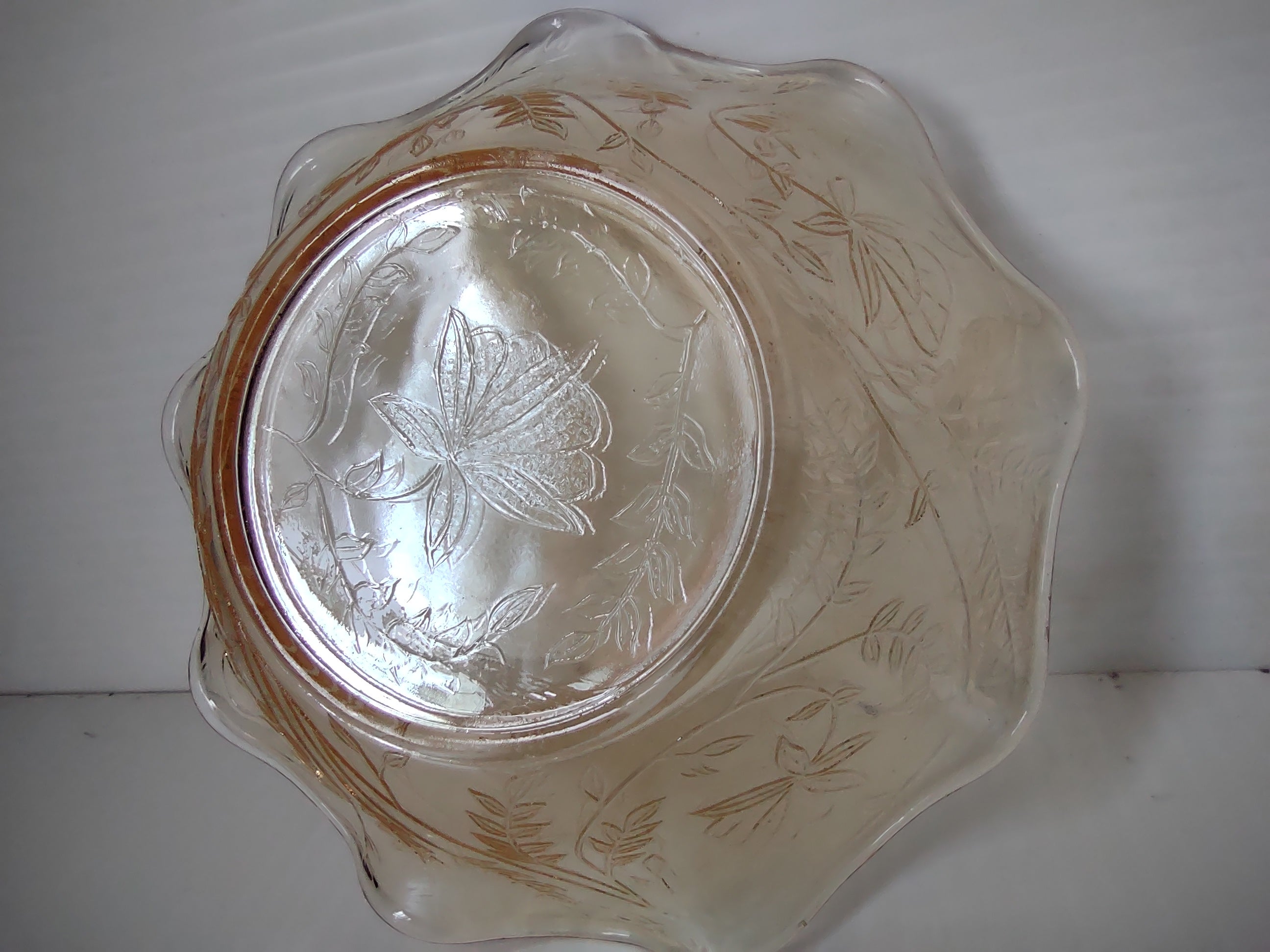 Vintage marigold carnival glass ruffled bowl top interior iris pattern
