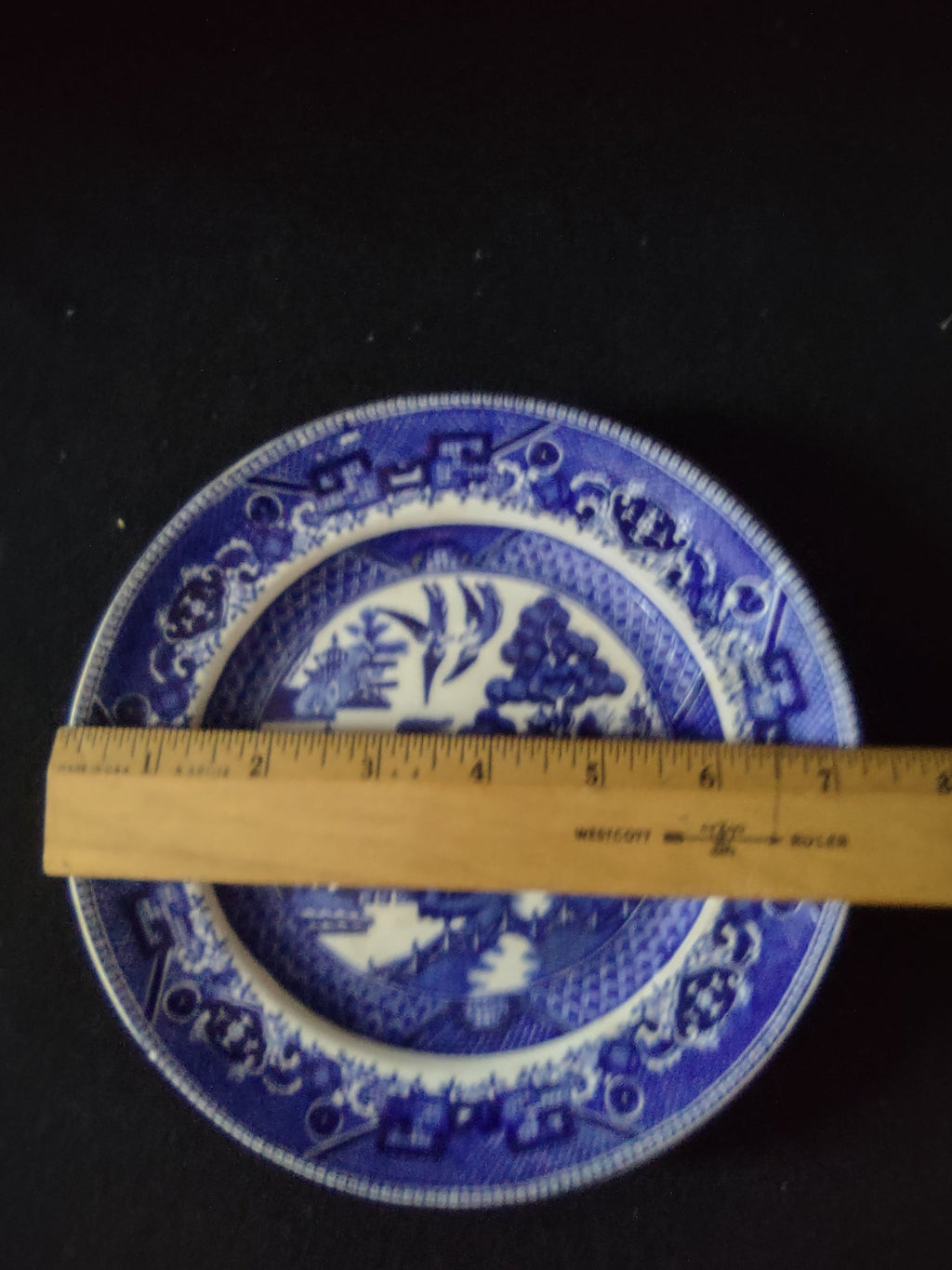 Vintage Buffalo Pottery Blue Willow Plate center scene close-up