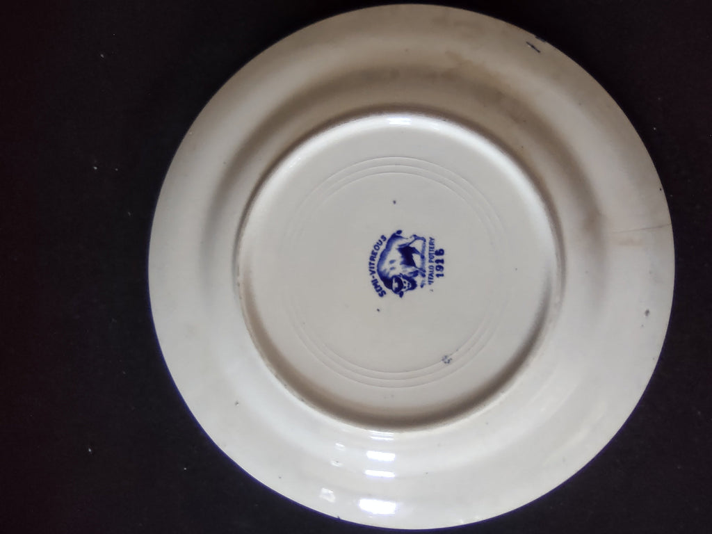 Vintage Buffalo Pottery Blue Willow Plate with ruler showing 7.5 inch size
