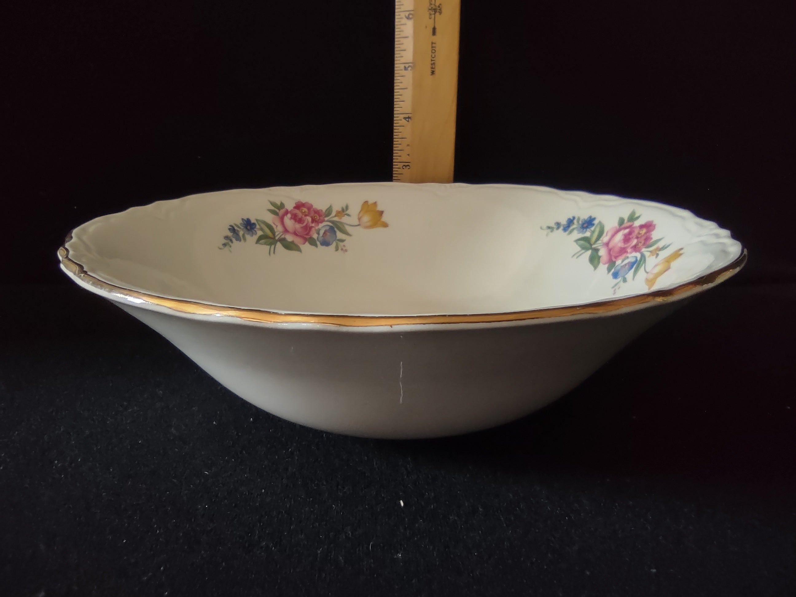 Vintage floral bouquet serving bowl - bottom/backstamp view showing plain white unglazed foot ring
