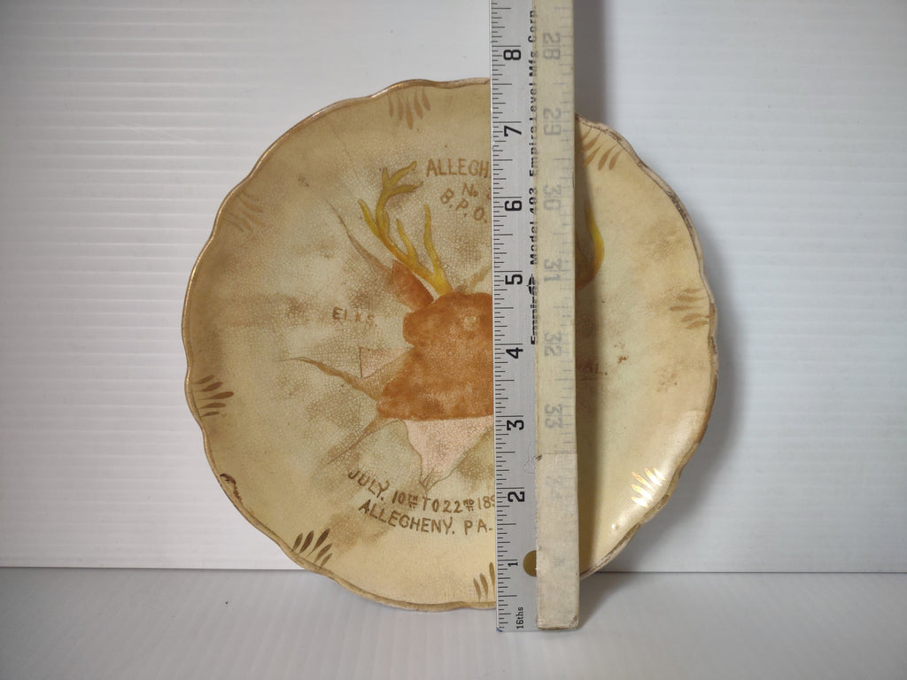 Backstamp reading Made by The American China Co Toronto Ohio with heavy crazing visible
