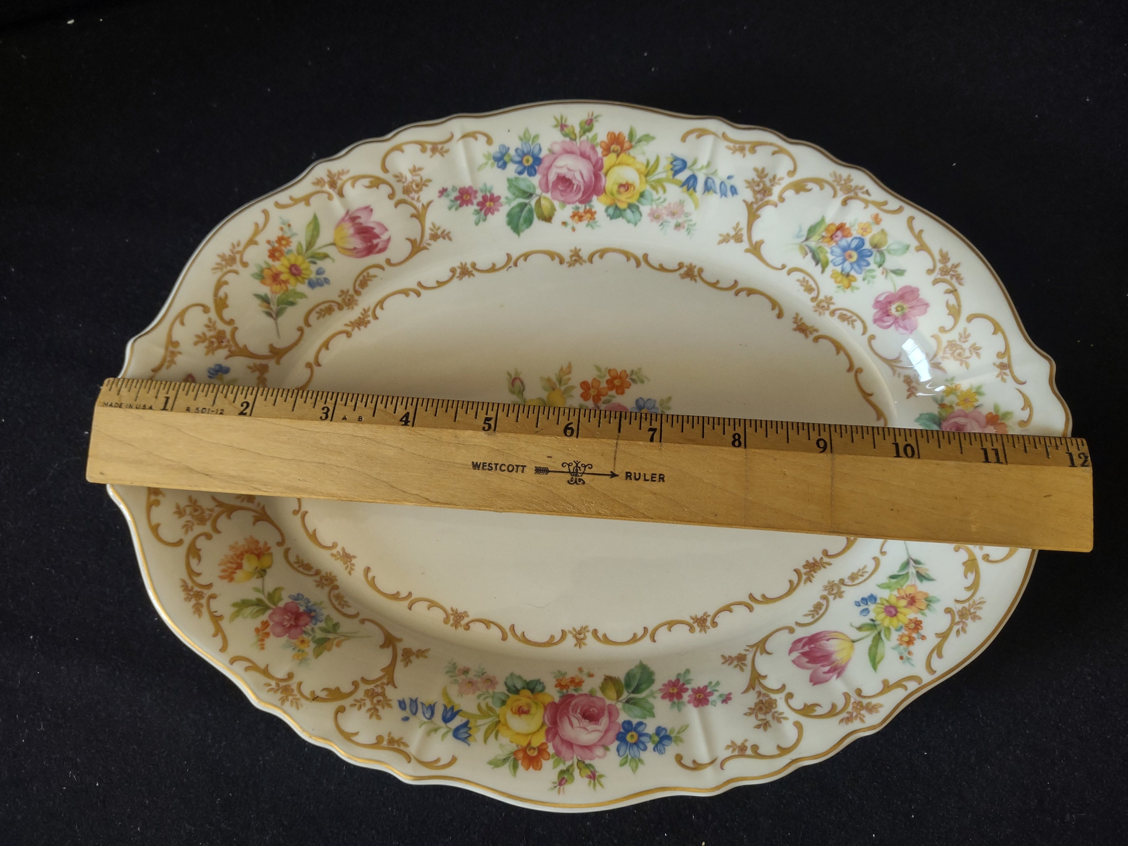 Vintage Syracuse China Federal Shape oval serving platter with multicolor floral bouquets, gold scrollwork border and scalloped gold edge, approximately 11 inches