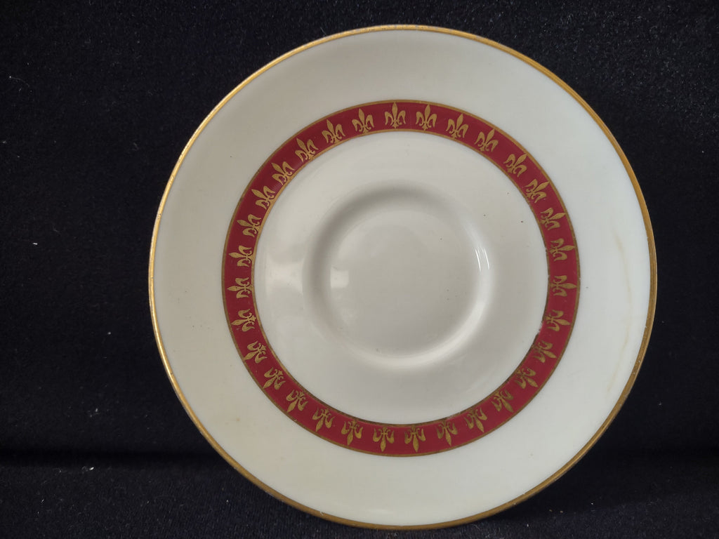 Vintage Theodore Haviland New York saucer, white with bold crimson red band featuring repeating gold fleur-de-lis motifs and gold rim, approximately 6 inches diameter