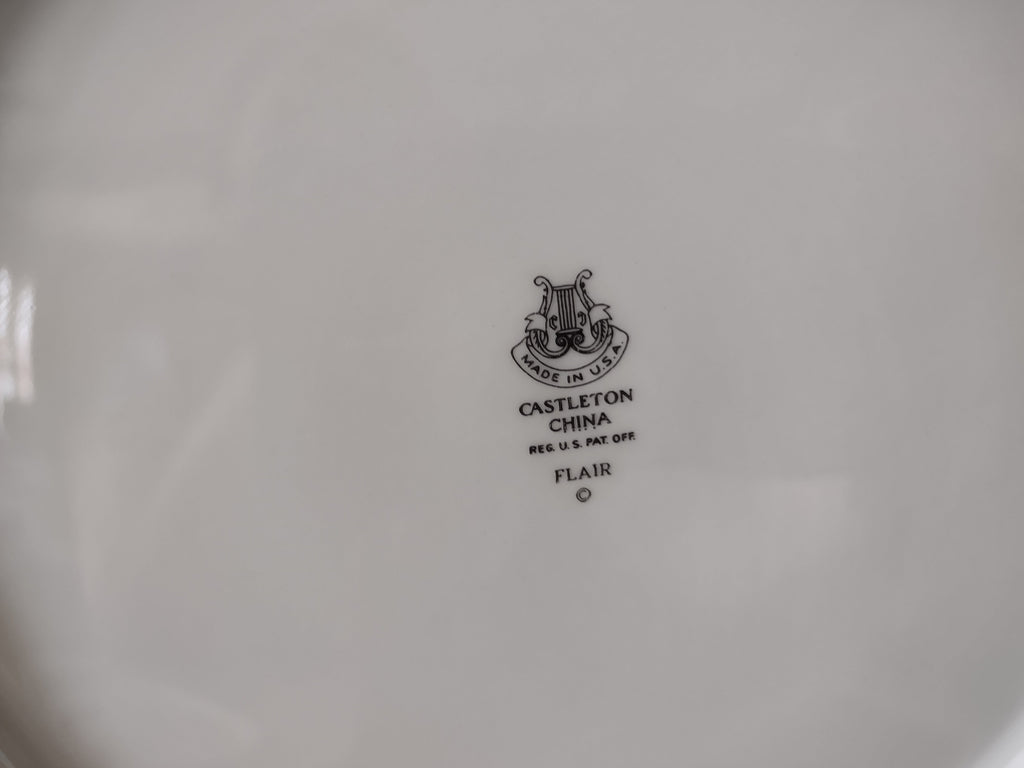 Castleton China Flair plate with ruler showing approximately 9 inch diameter