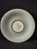 Castleton China Flair saucer top view showing gray leaf and pink floral motif with gold rim, approximately 6 inches diameter