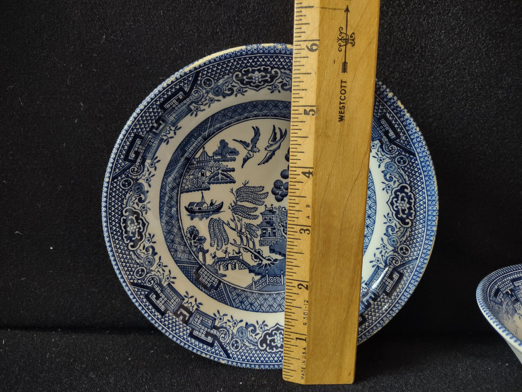 Churchill England Blue Willow saucer with ruler showing approximately 6 inch diameter