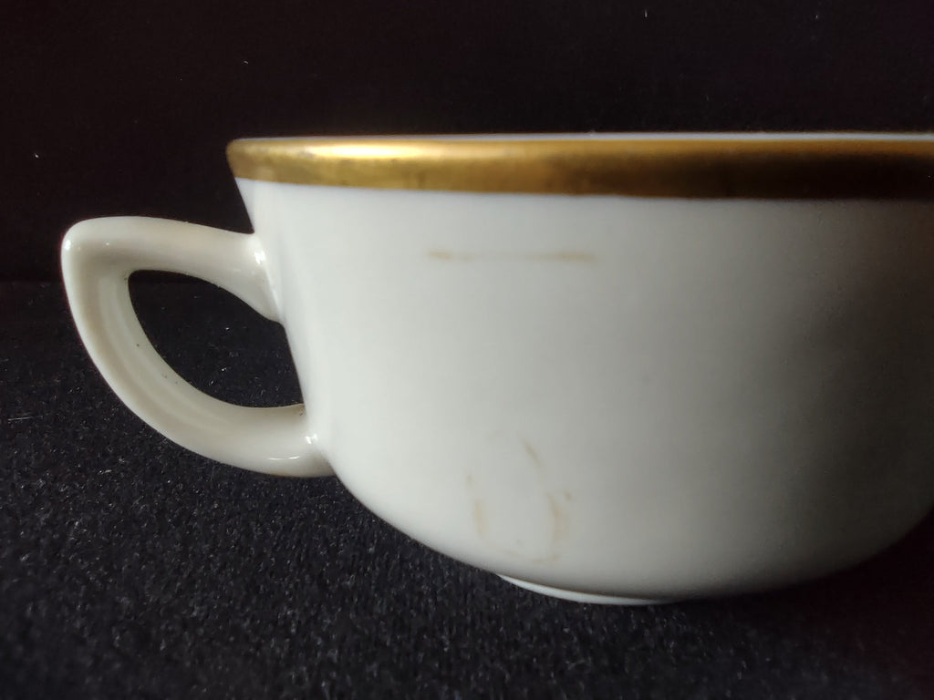 Set of 2 Syracuse China off-white gold band tea cups side by side