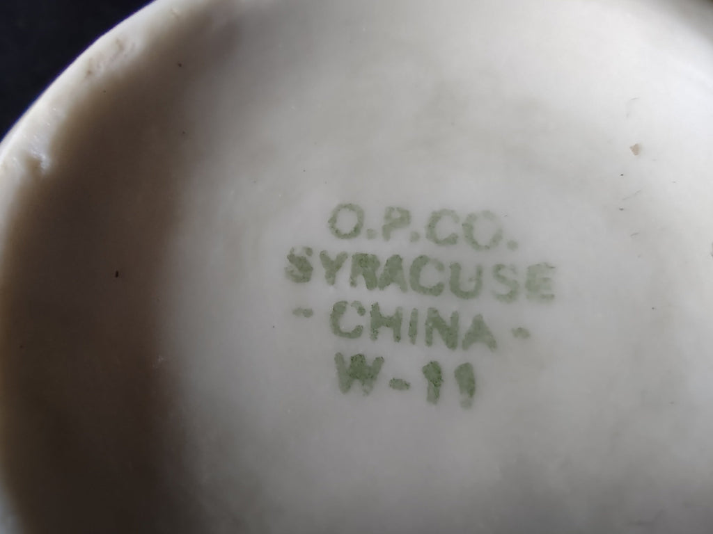 Close-up of gold band rim and handle on Syracuse China tea cup