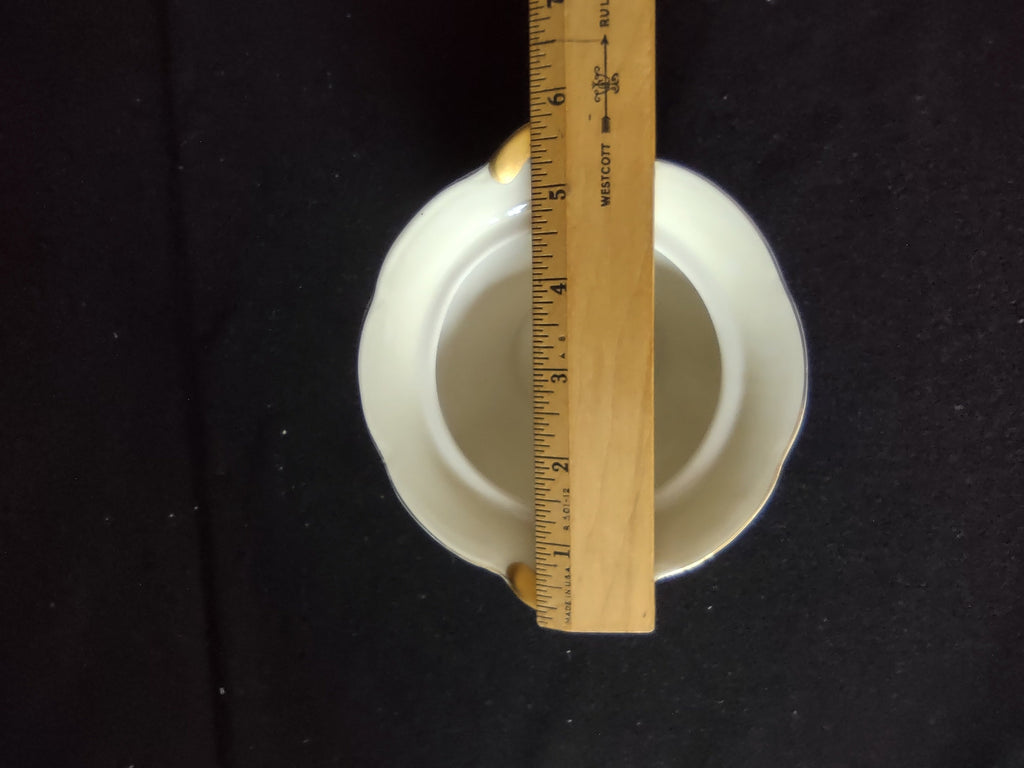 Vintage Theodore Haviland Leeds cream soup bowl side view showing gold trim lines