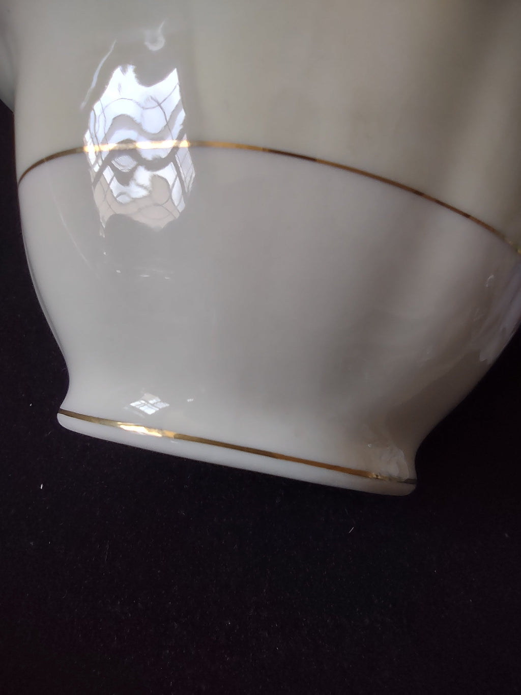 Vintage Theodore Haviland Leeds cream soup bowl top view with two gold handles