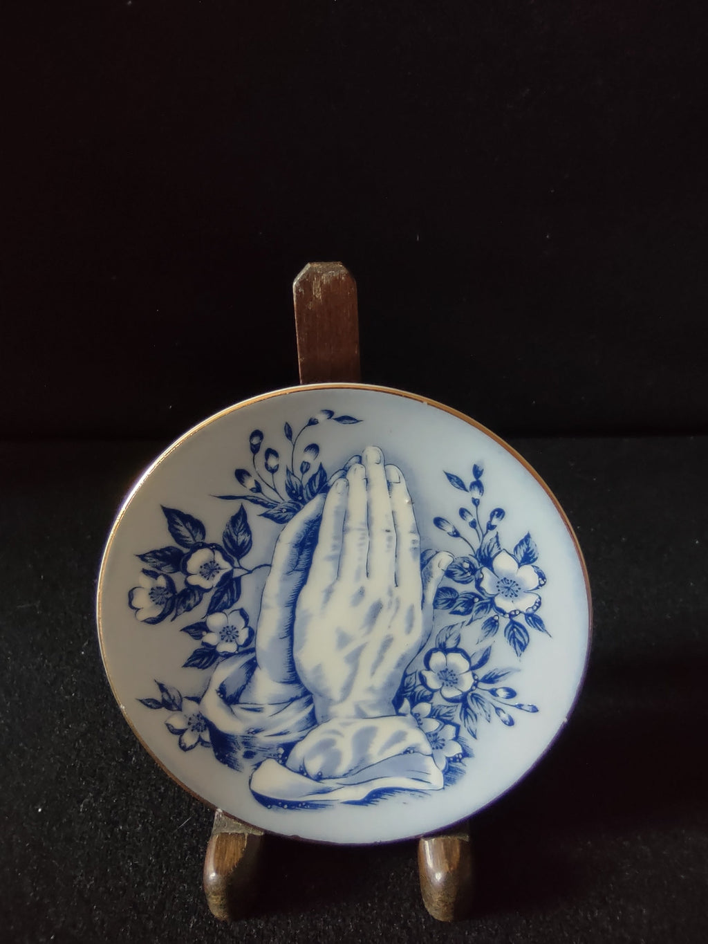 Vintage blue white praying hands floral wall plate front view