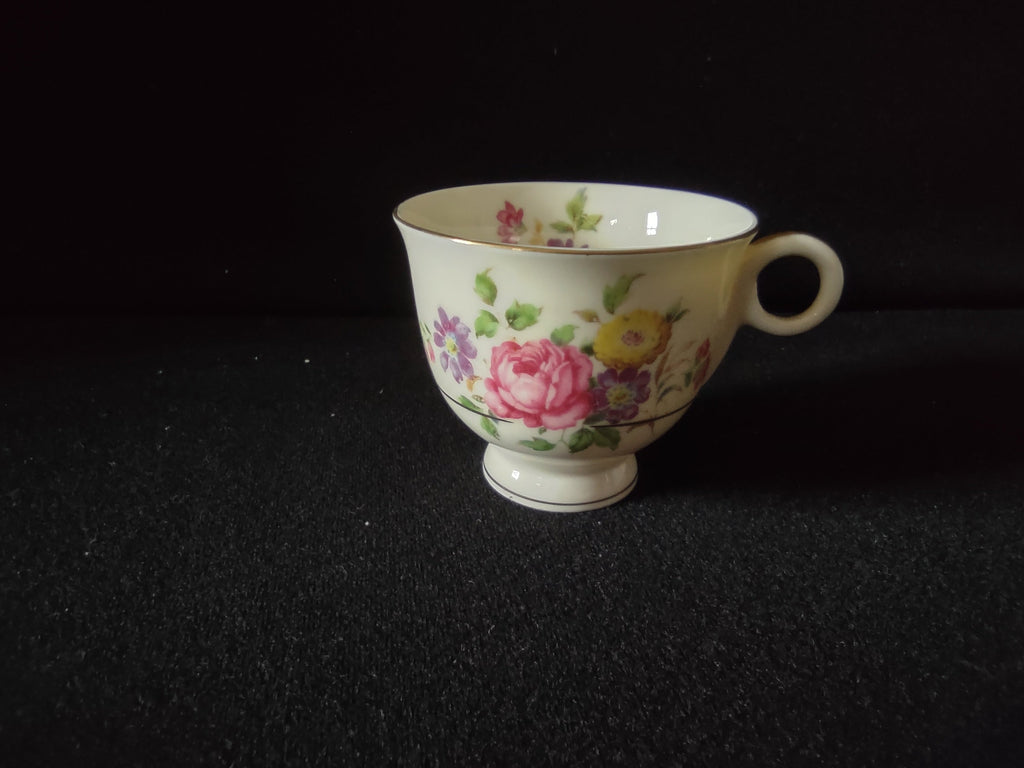Vintage Theodore Haviland Pasadena teacup front view showing pink rose floral bouquet