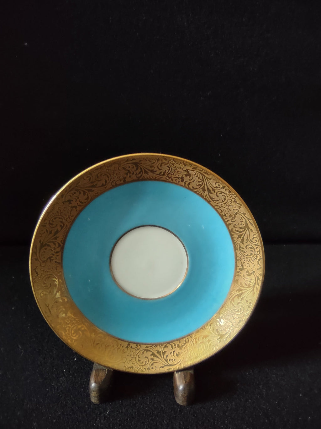 Turquoise and gold encrusted saucer top view