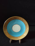 Turquoise and gold encrusted saucer top view