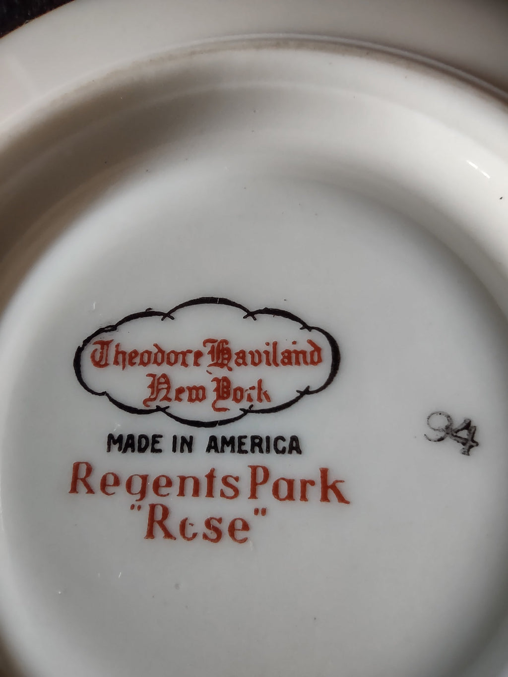 Theodore Haviland Regents Park Rose saucer side profile showing embossed rim depth