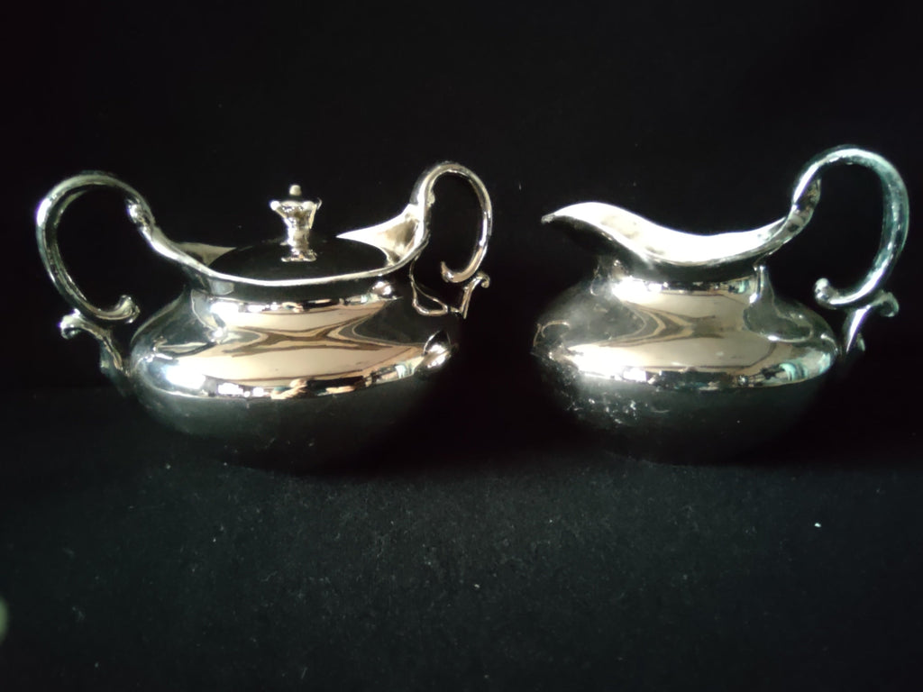 Vintage silver plated sugar bowl with lid and two handles