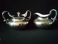 Vintage silver plated sugar bowl with lid and two handles