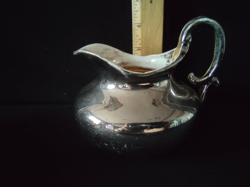 Vintage silver plated creamer with handle and spout