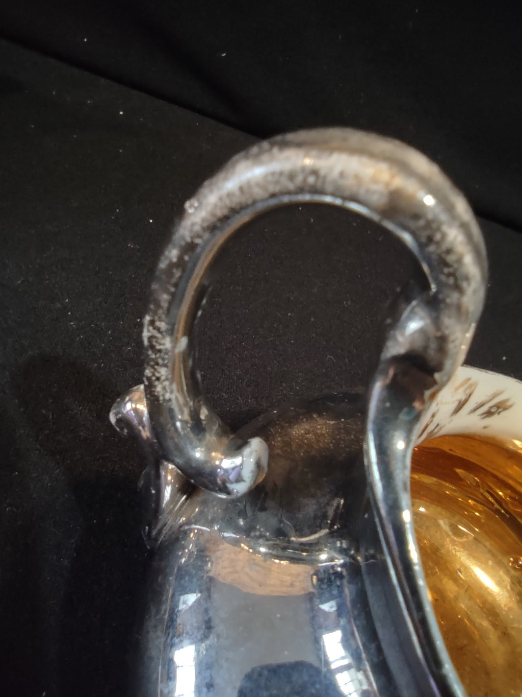 Sugar bowl bottom showing interior scratches