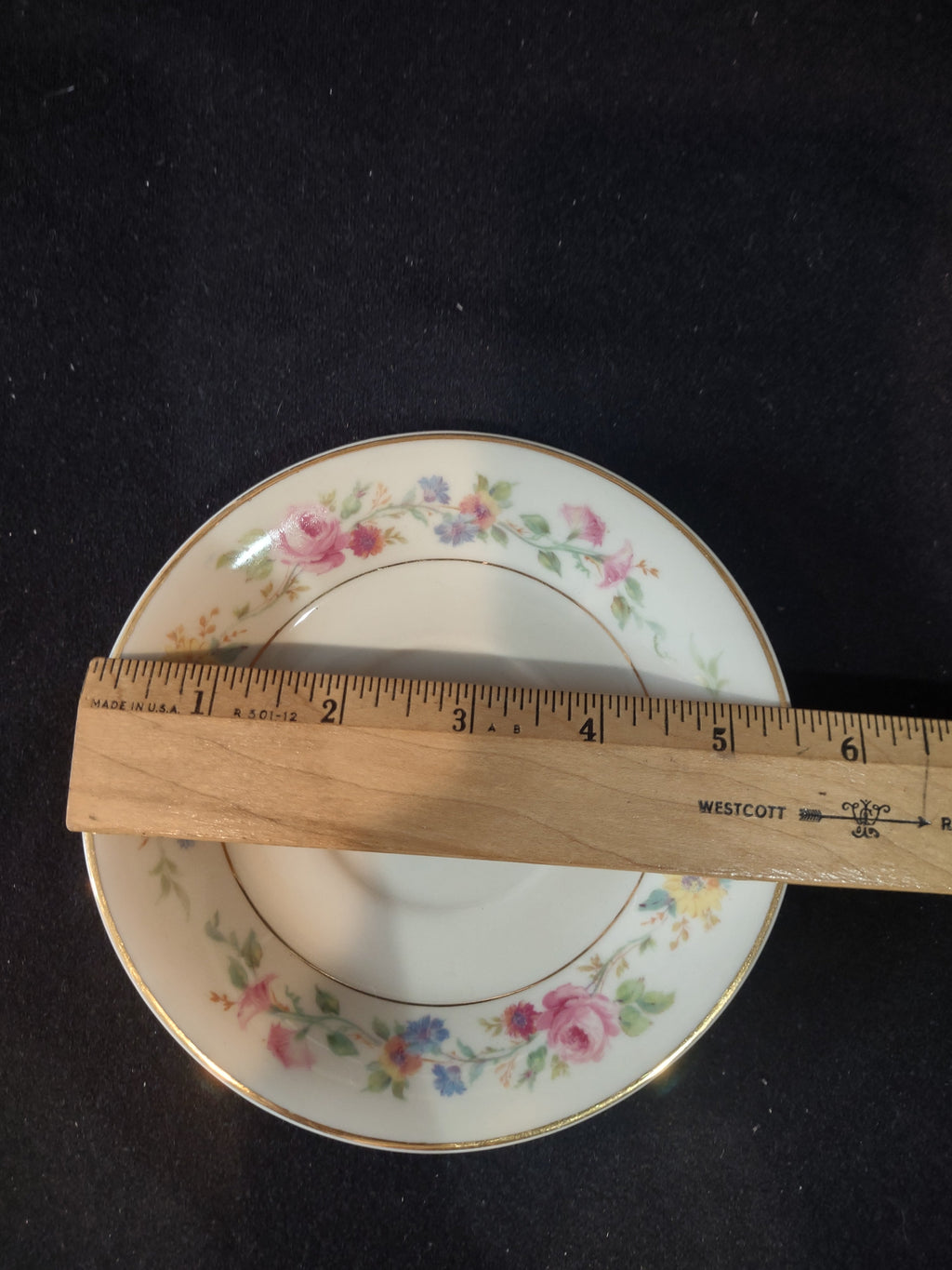 Vintage Syracuse China Old Ivory floral saucer front view