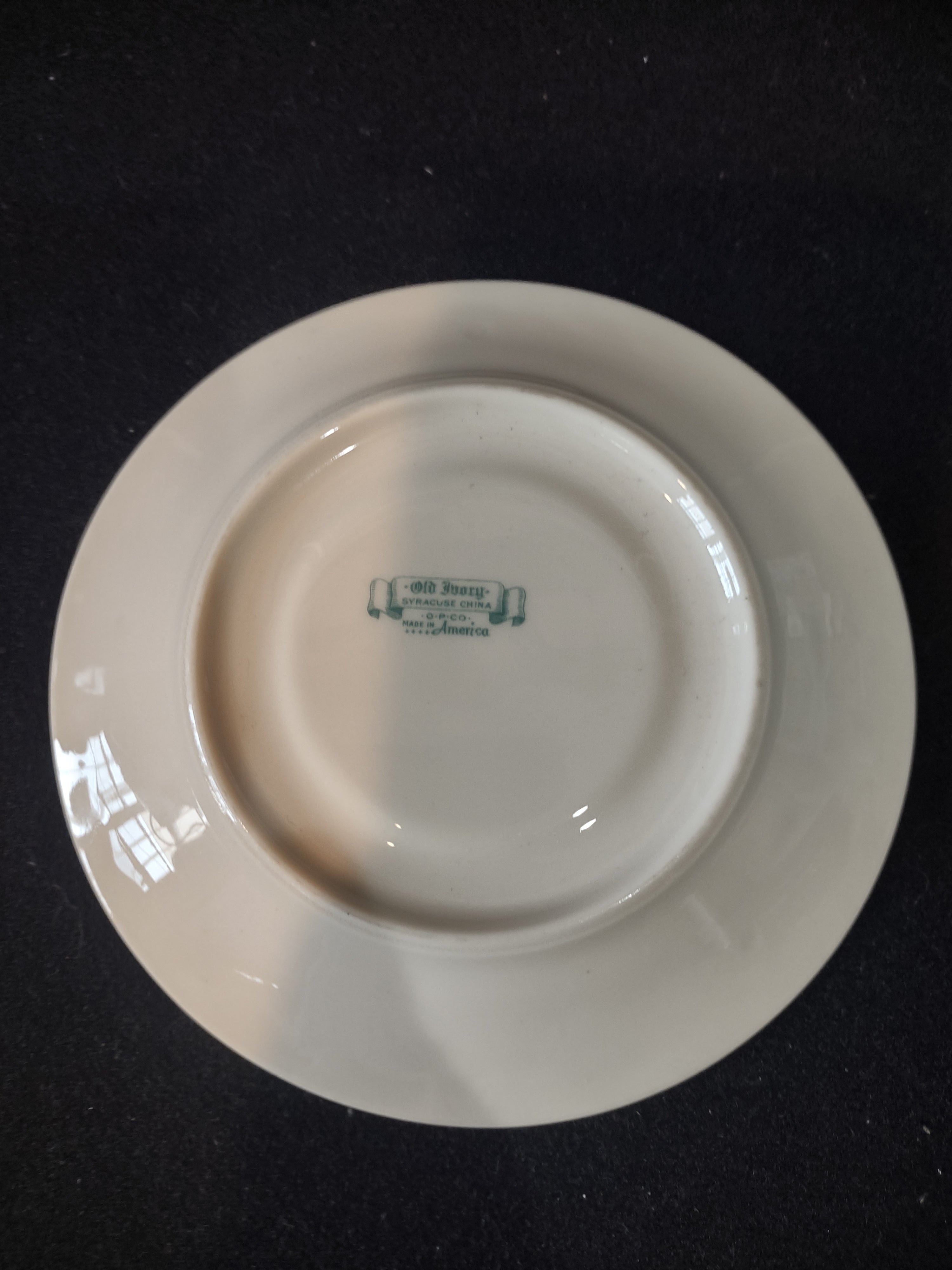 Vintage Syracuse China Old Ivory floral saucer with ruler showing 6 inch diameter