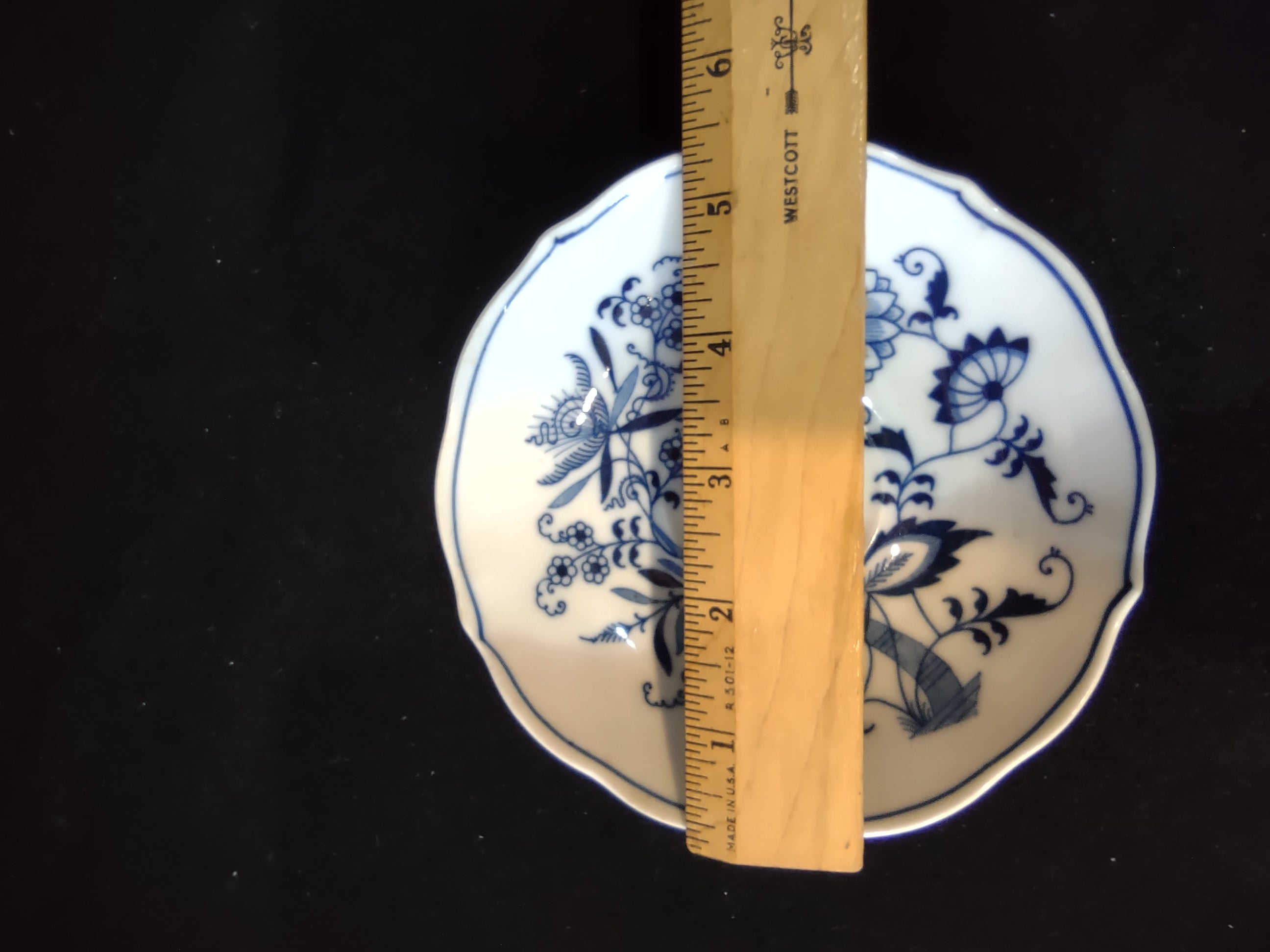 Blue Danube Blue Onion saucer close-up of floral pattern and scalloped edge