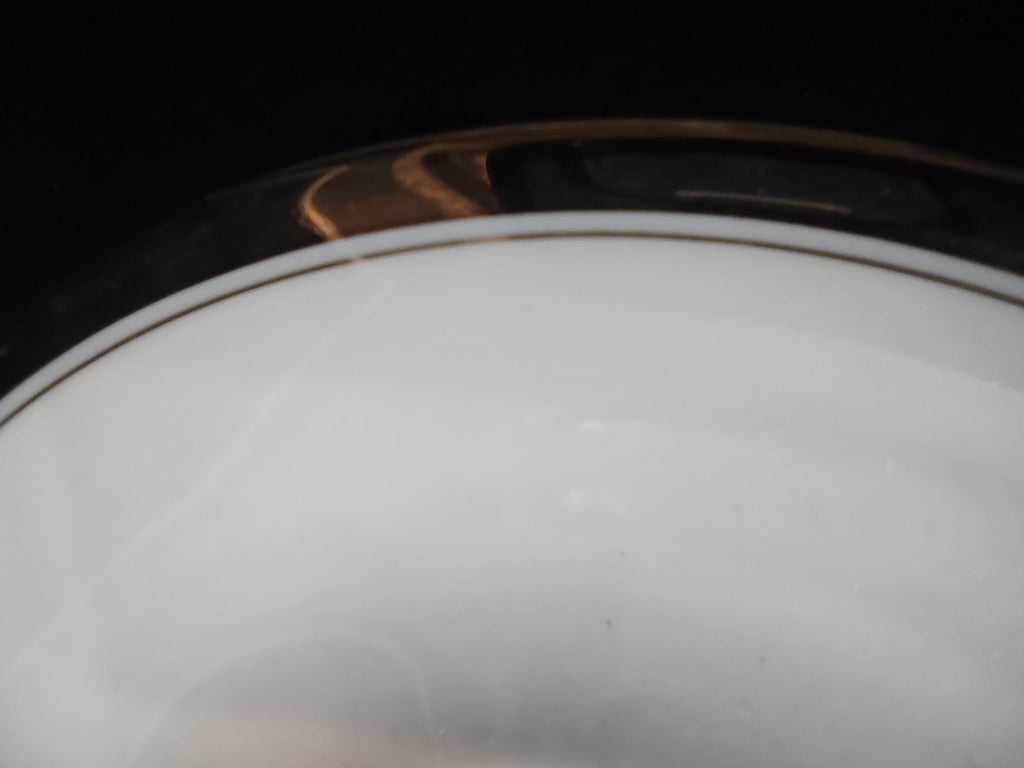 Syracuse China Countess saucer with ruler showing approximately 6 inch diameter