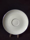 Pickard China Brocade saucer top view showing embossed floral border and platinum rim