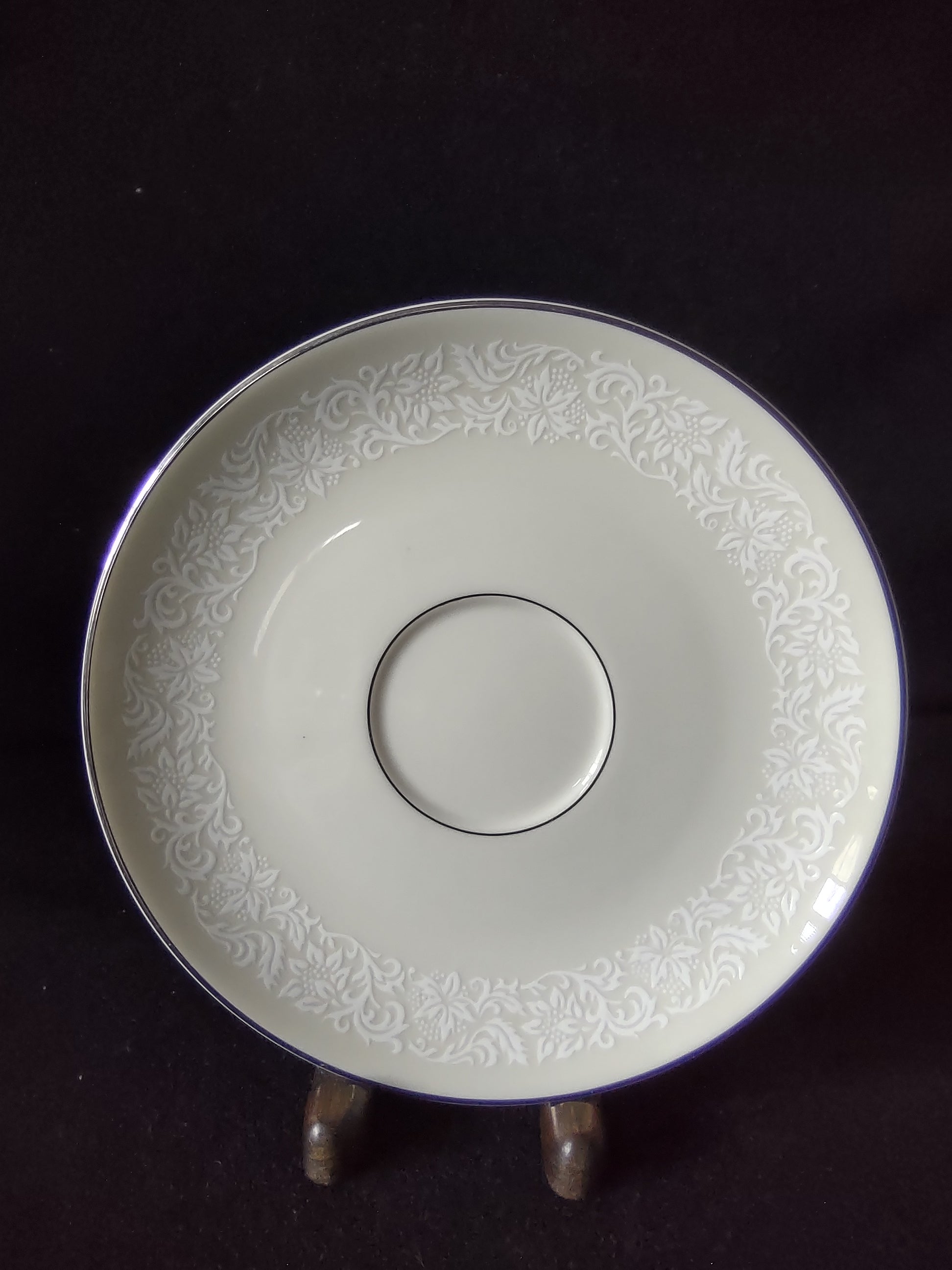 Pickard China Brocade saucer top view showing embossed floral border and platinum rim