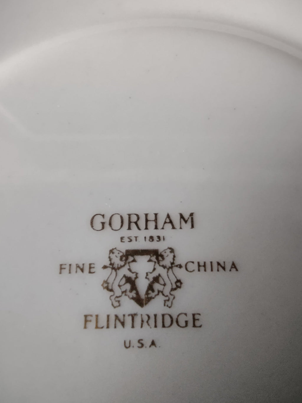 Gorham Flintridge saucer with ruler for size reference