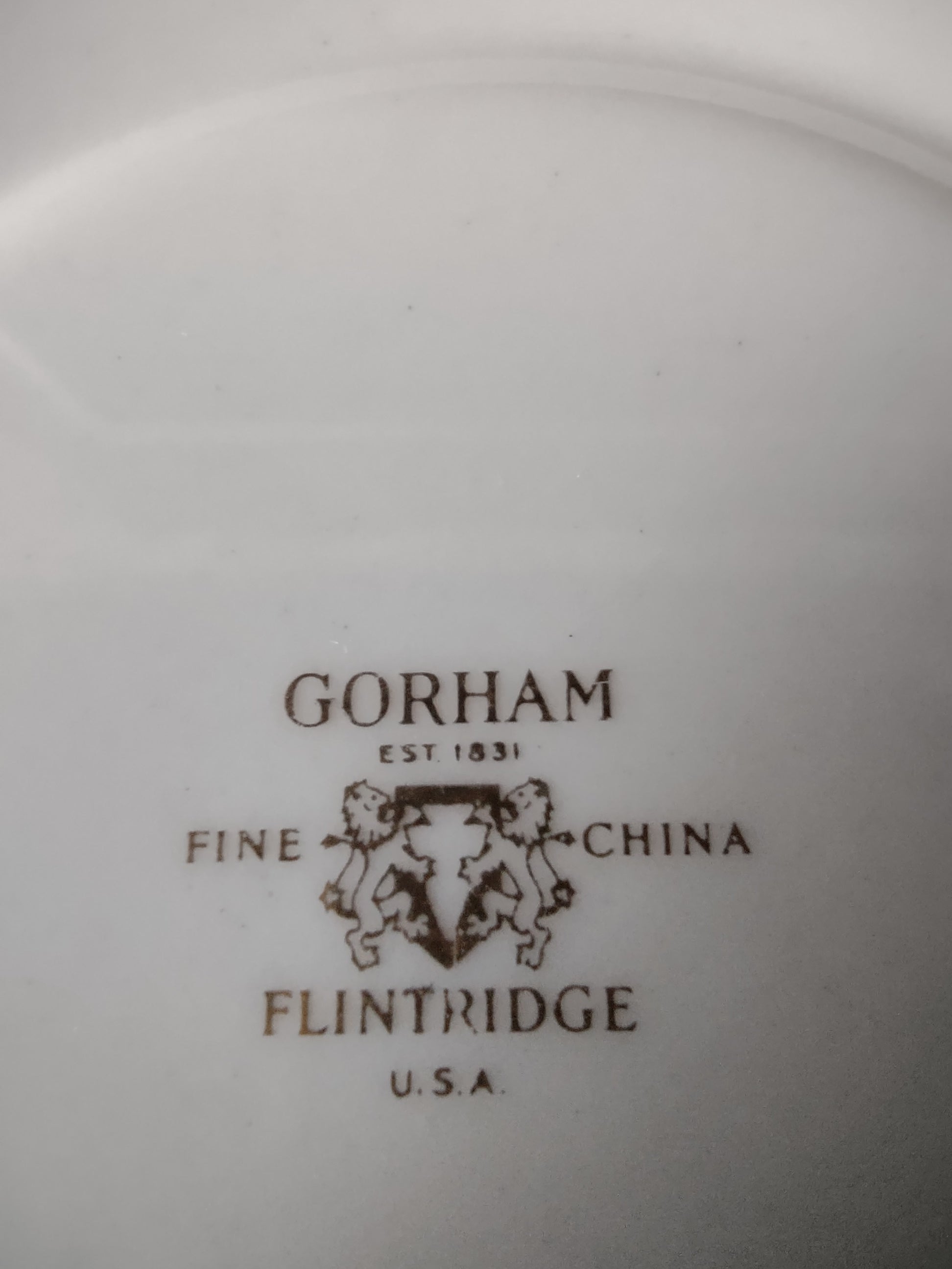 Gorham Flintridge saucer with ruler for size reference