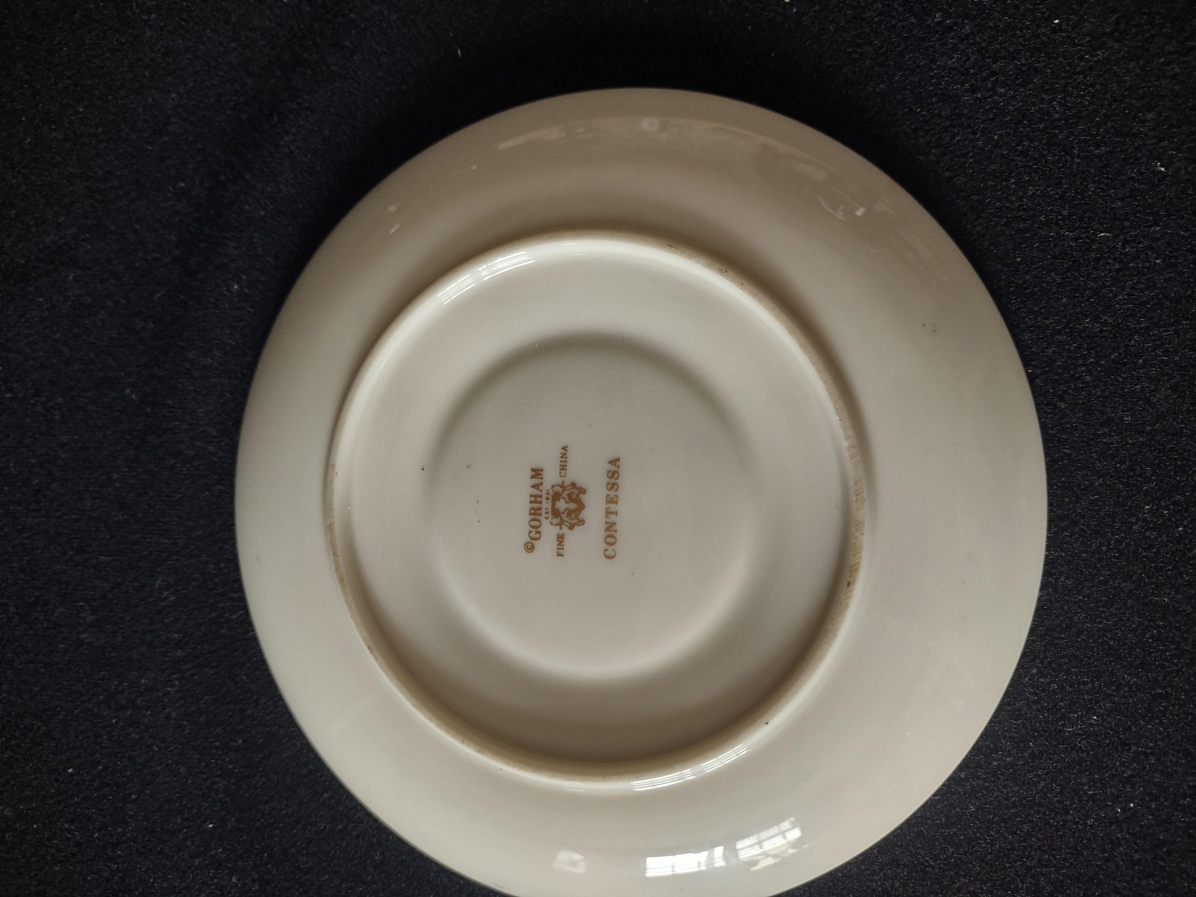 Gorham Contessa saucer close-up of platinum and teal rim band