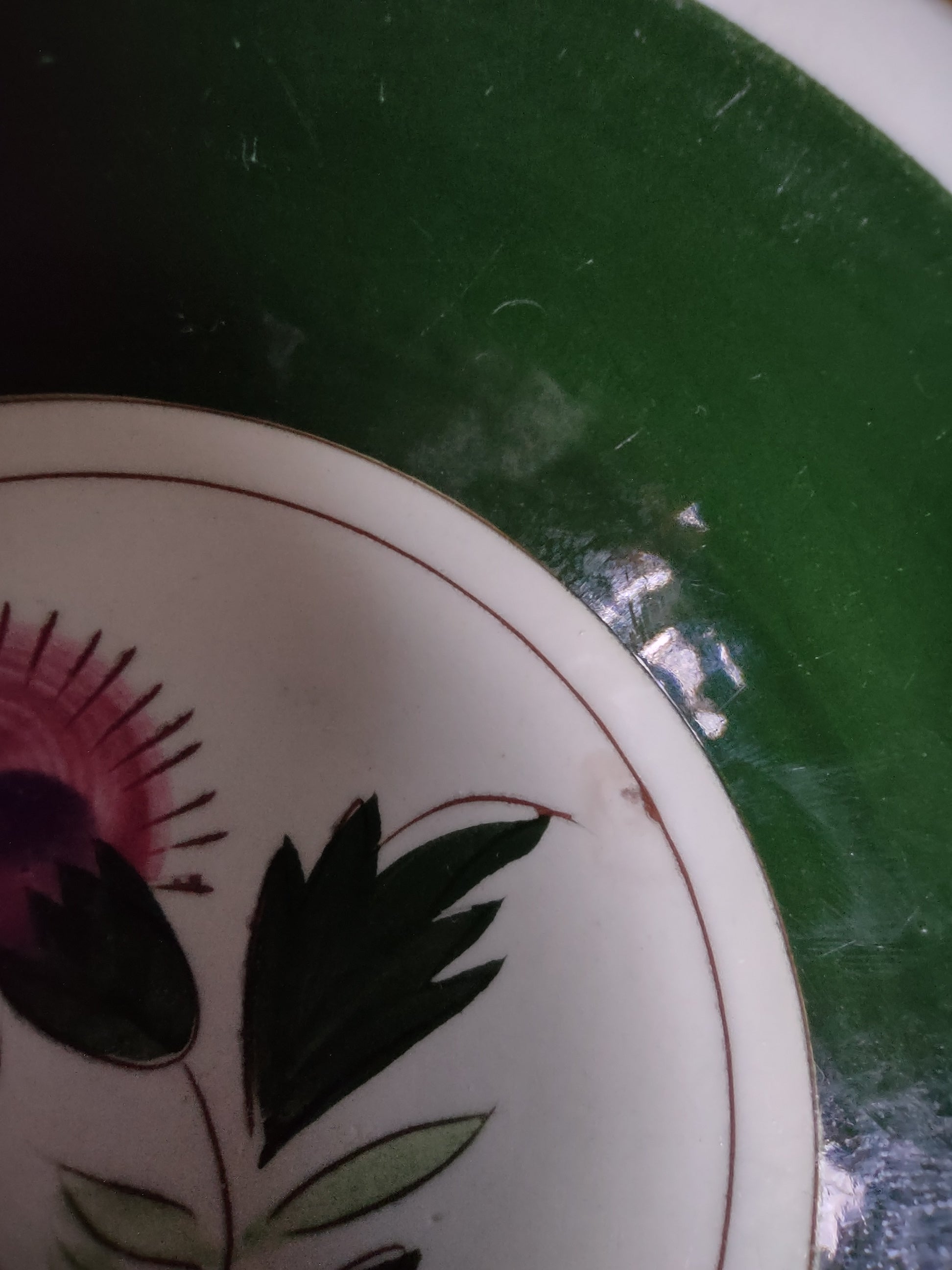 Stangl Pottery Thistle fruit bowl side view showing green rim and white center medallion