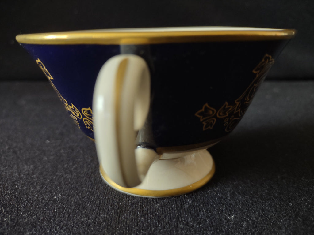Alvin USA cobalt blue cup handle side view showing chip