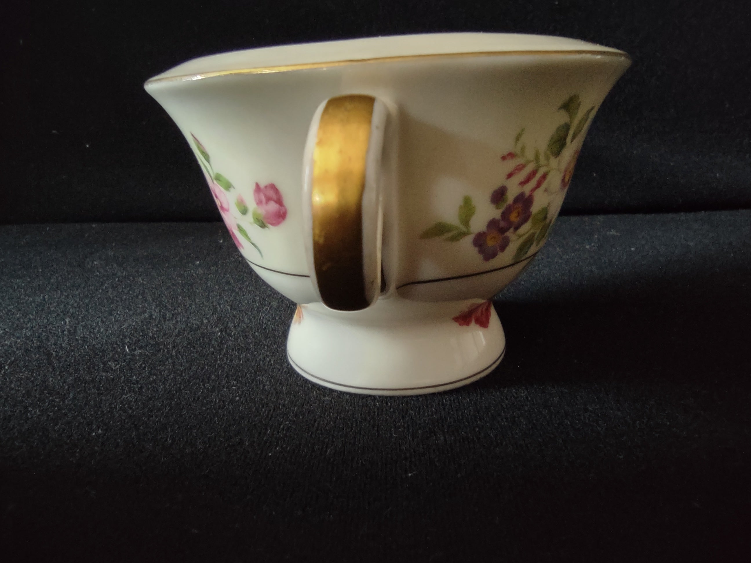 Theodore Haviland Pasadena creamer spout chip close-up