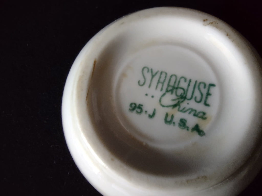Syracuse China 95-J backstamp close-up showing discoloration on foot ring