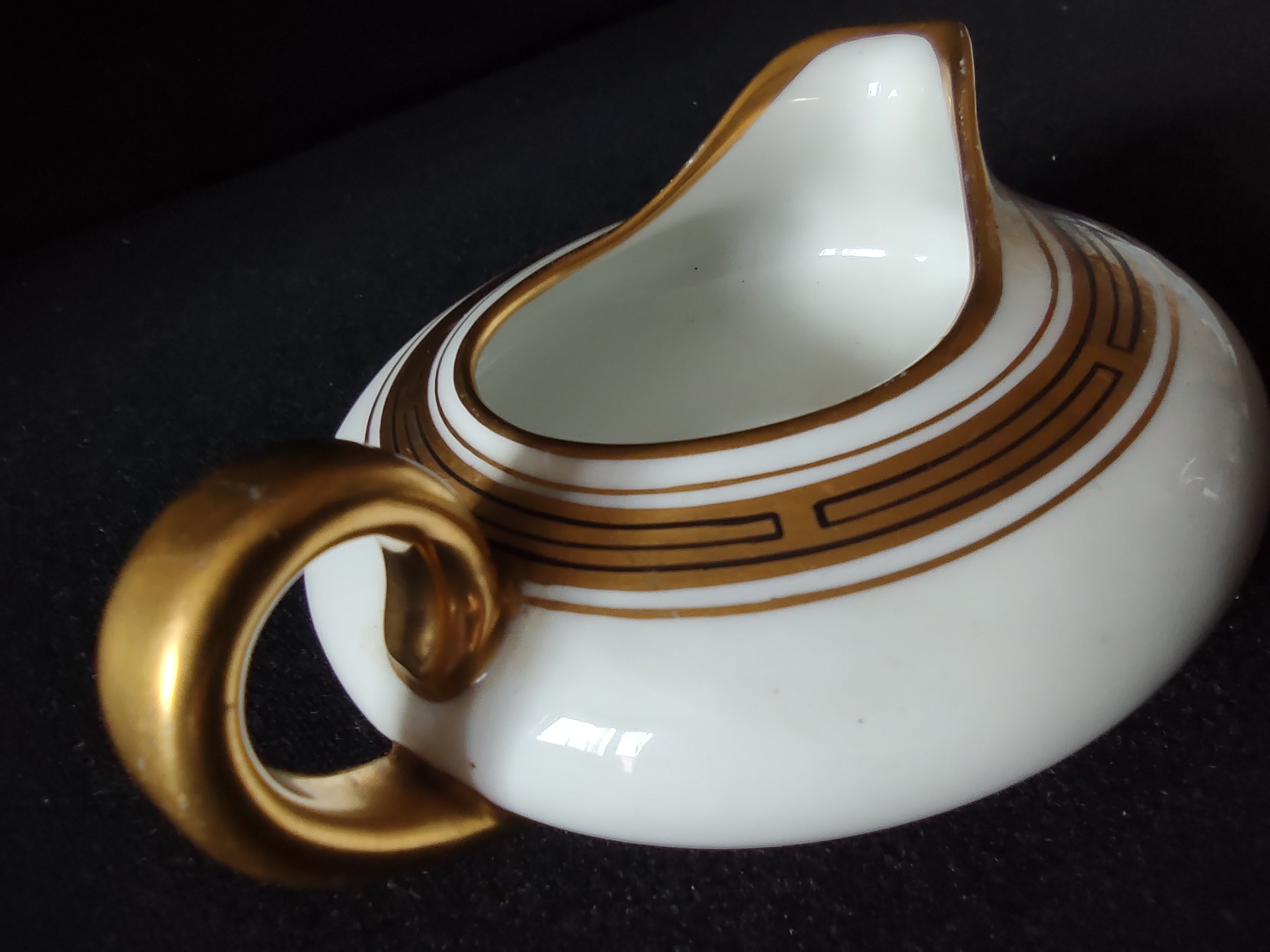 Limoges France creamer top-down view showing Greek key band