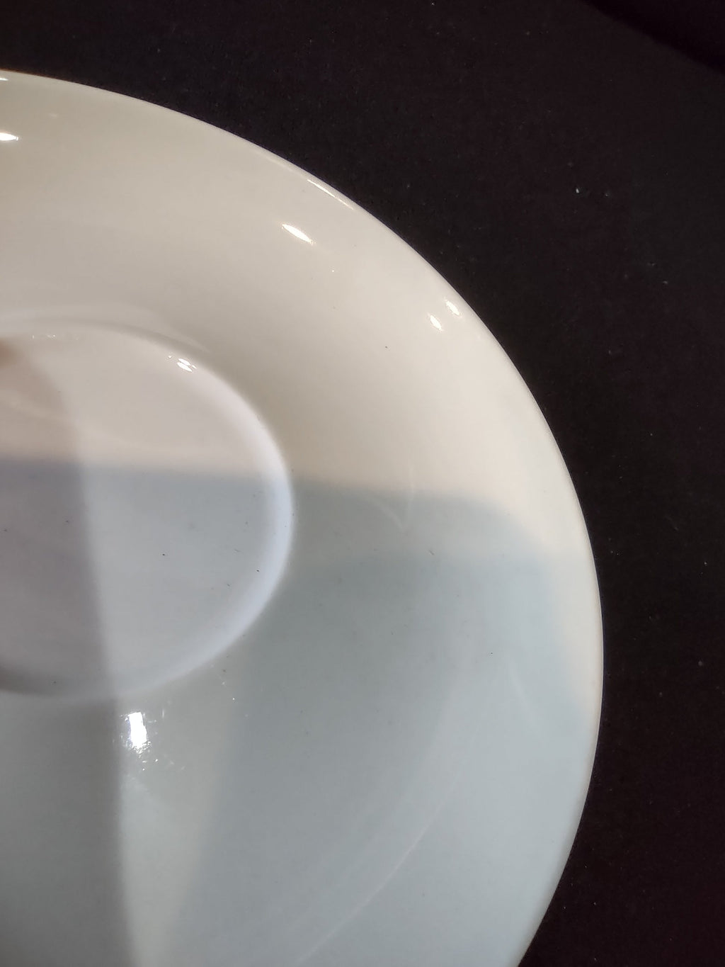 Franciscan Whitestone Ware saucer surface detail