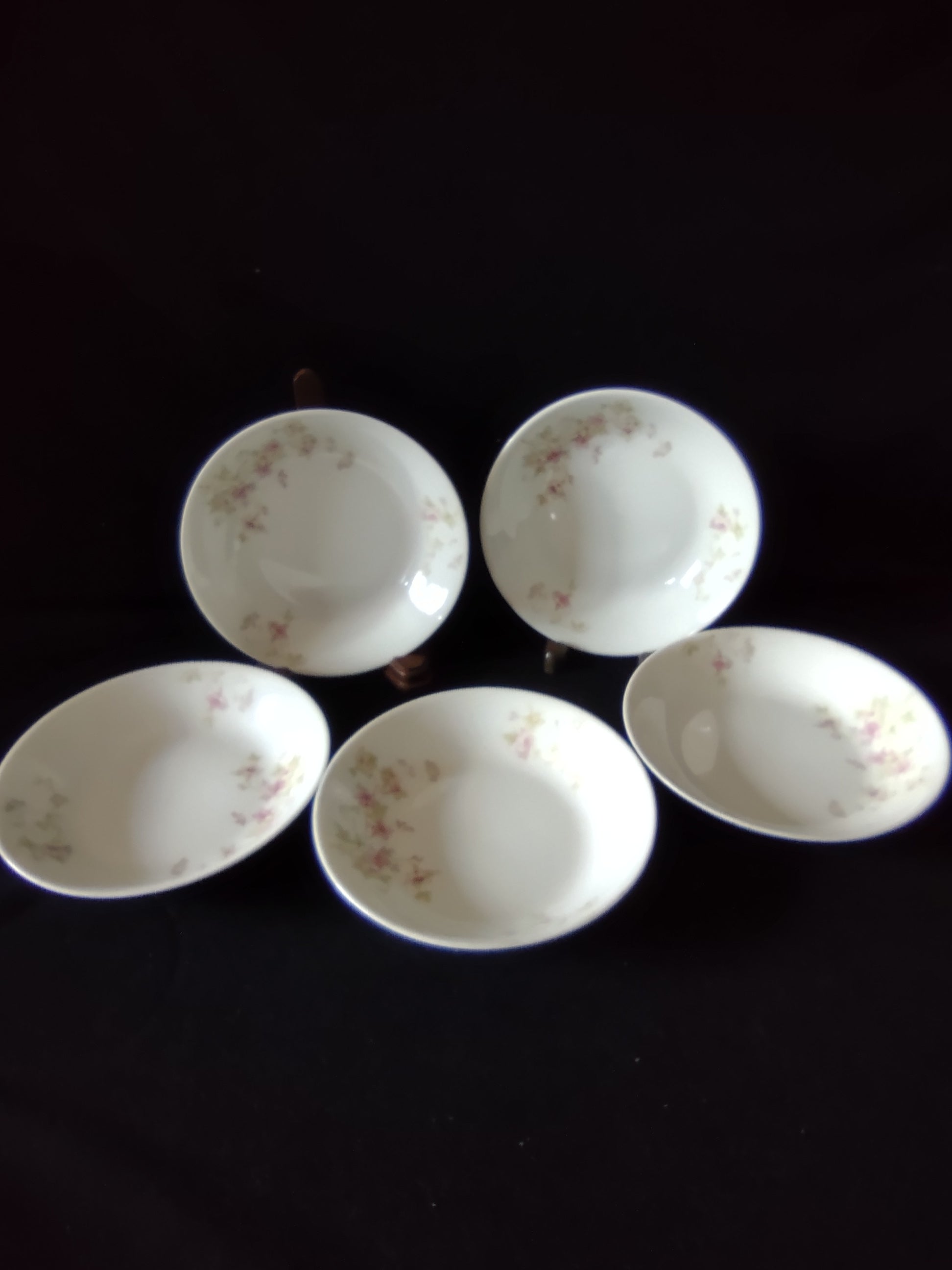 Close-up of pink floral and green vine pattern on O.P. Co. Syracuse China berry bowl