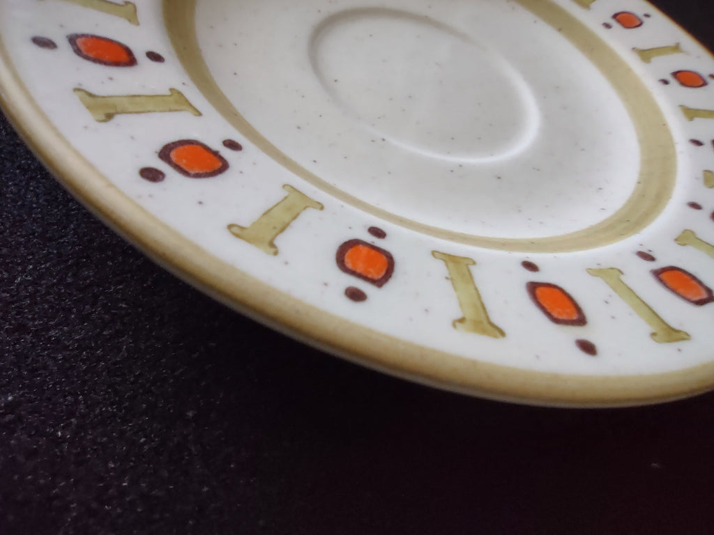 Metlox Poppytrail Navajo saucer with ruler showing approximately 6 inch diameter
