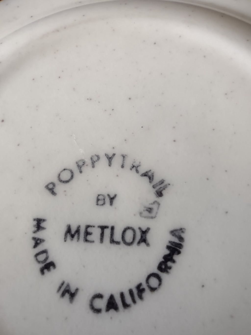 Poppytrail by Metlox Made in California backstamp on bottom of Navajo saucer