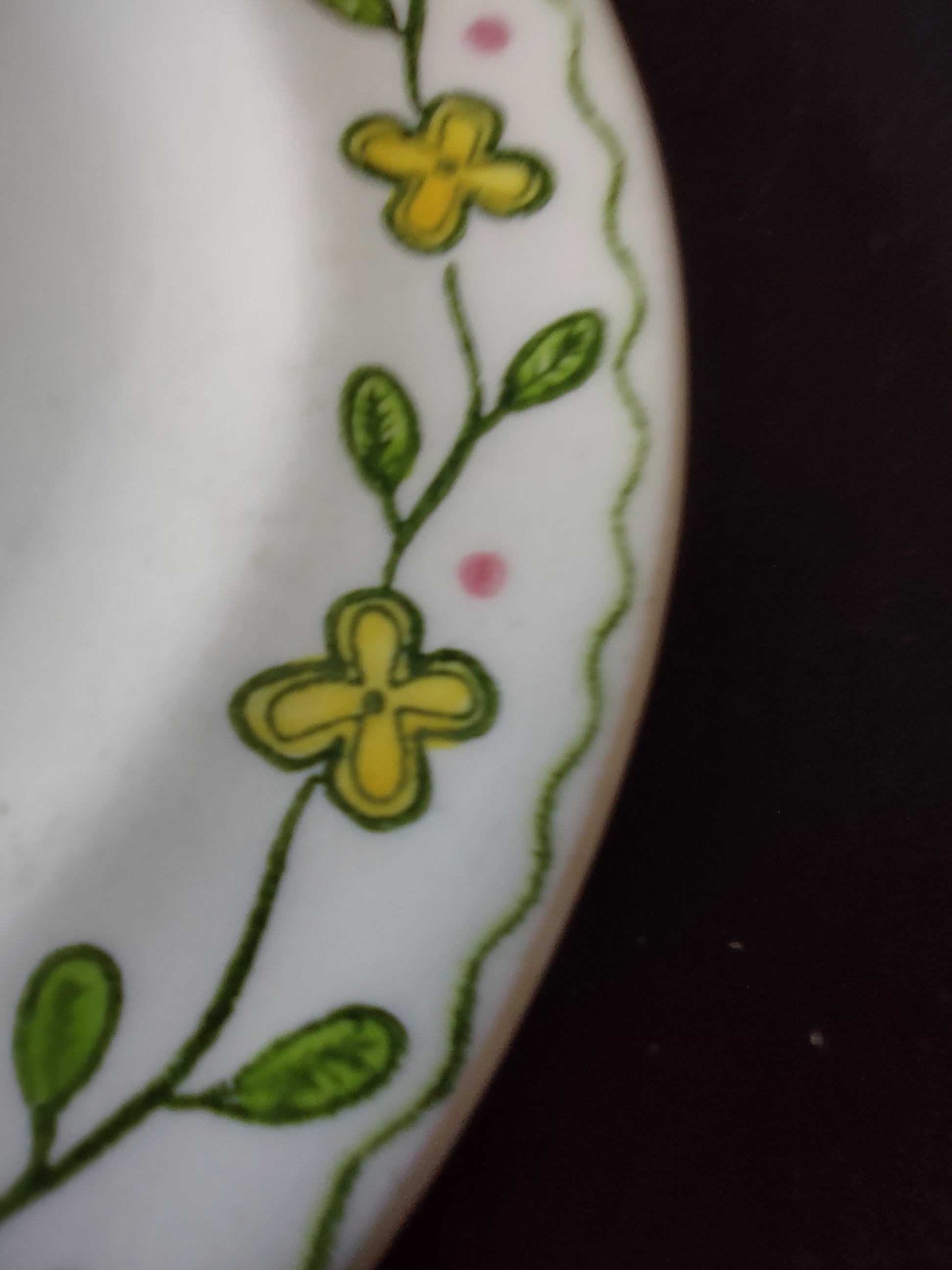 Close-up of Watt Pottery Happy Time backstamp reading Hand Painted Watt Pat Pend Wa Inn Restos