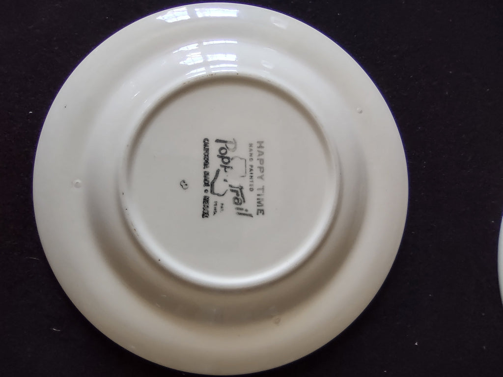 Bottom of Metlox Poppytrail Happy Time saucer showing Poppytrail Made in California backstamp