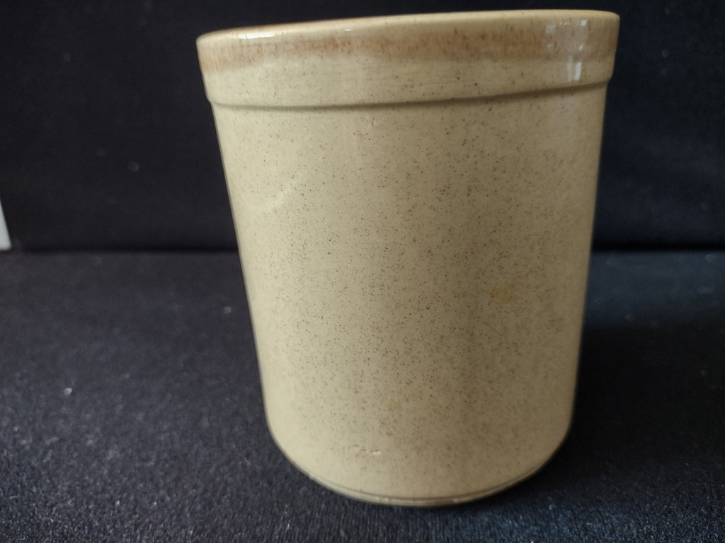 Bottom of vintage stoneware crock showing artist signature Bk 92