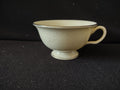 Vintage Cathedral Fine China footed teacup side view showing embossed rose pattern and platinum trim