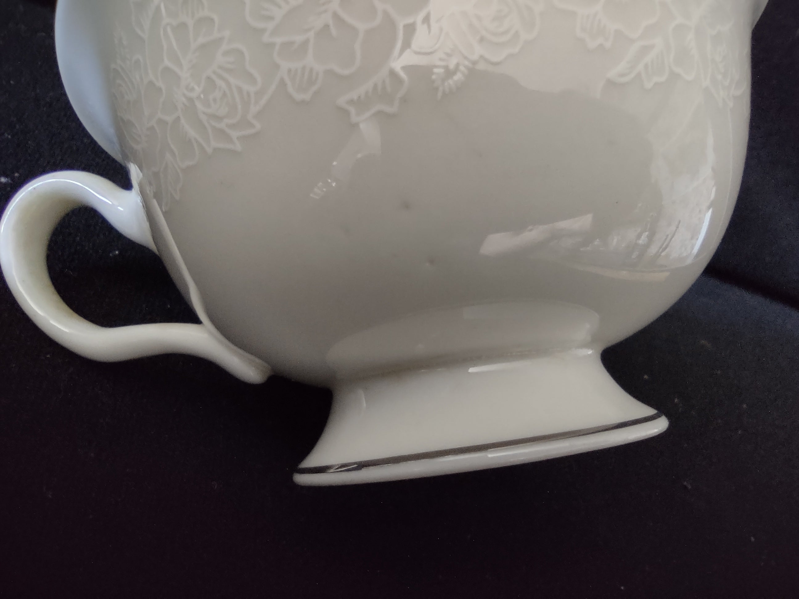 Vintage Cathedral Fine China footed teacup close-up of foot ring with platinum trim