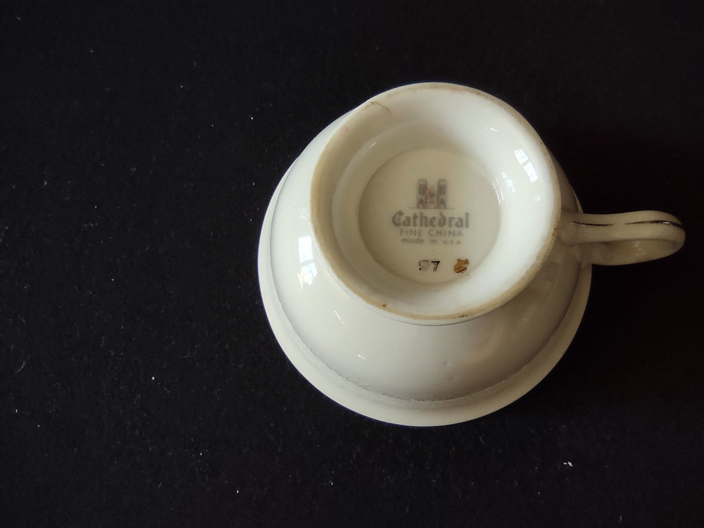Vintage Cathedral Fine China footed teacup opposite side view showing embossed rose pattern